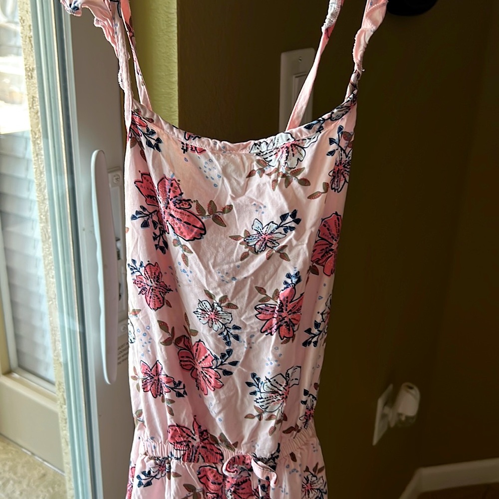 Floral romper and cross sectioned back